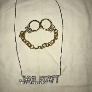 Jailbait necklace and handcuffs bracelet